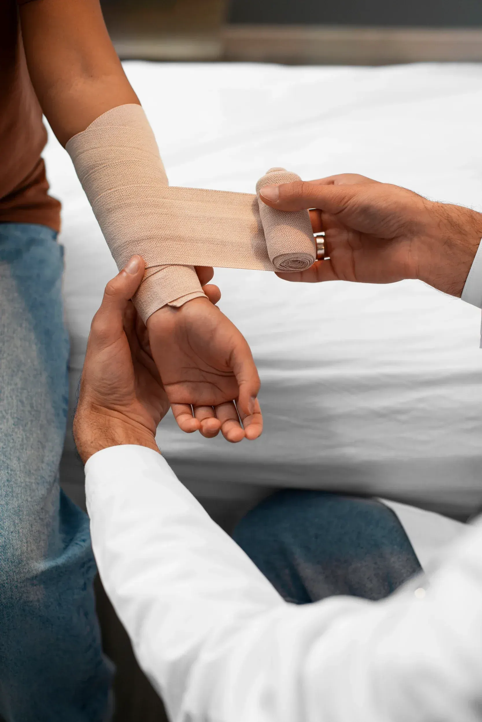 Orthopedic surgeon reviewing healing progress with patient