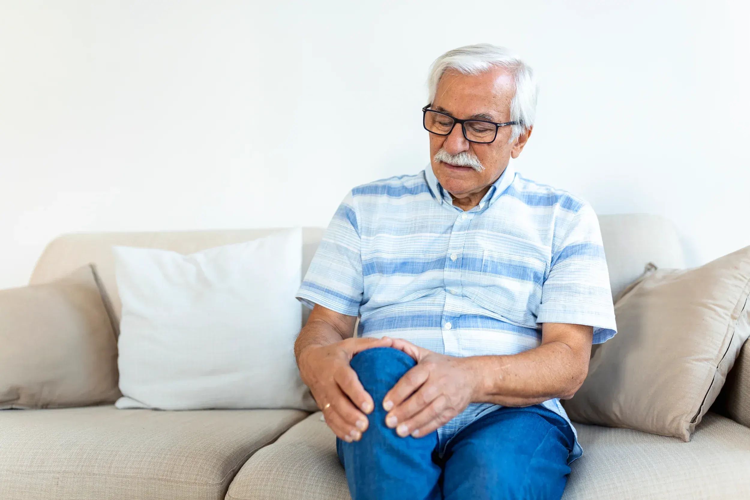 Patient with knee arthritis being evaluated by an orthopedic surgeon in Fort Walton Beach